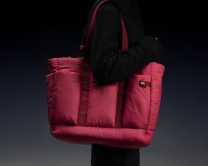 DailyObjects Idyll Tote bag in soft neutral shade carried over the shoulder, spacious and chic for daily use.