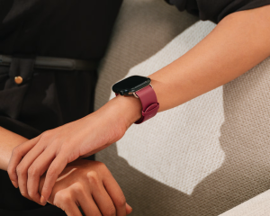 Maroon Forest Ellipse Leather Apple Watch Band showcased on wrist by DailyObjects