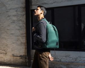 Pedal Daypack from DailyObjects worn as a backpack in an urban setting, lightweight and built for movement.