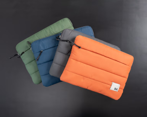 DailyObjects Stria Laptop Sleeves in green, blue, grey and orange — soft padded sleeves ideal as Secret Santa gifts for men.