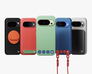 Woman leaning on desk watching content on Pixel 10 propped up with blue Stack phone grip stand.