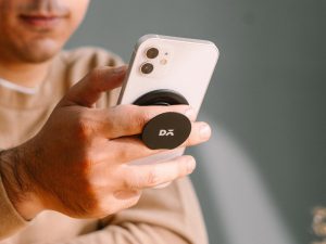 Anti slip phone accessory attached to a DailyObjects phone case for better handling