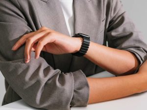 Metal smartwatch strap styled with an evening outfit for a modern look