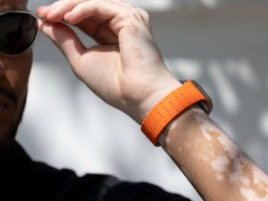 Minimal smartwatch strap paired with a smart casual office outfit