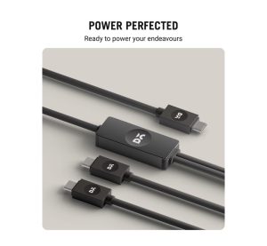 4 in 1 100W charging cable warming up while charging a laptop and phone simultaneously on a desk