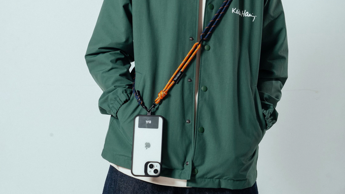Phone lanyard to prevent drops worn crossbody during busy outdoor events