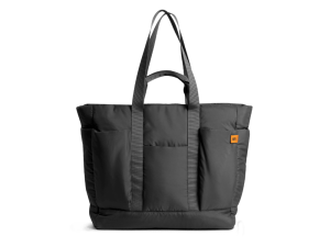 Idyll tote bag carrying a laptop, notebook, and daily essentials