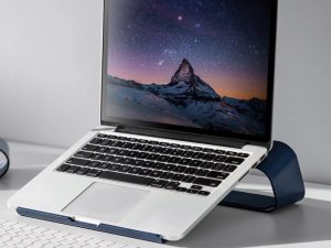 Work from home desk setup in India using laptop stand to manage overheating