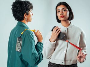 Phone lanyard for metro and bus use keeping phone accessible during commute