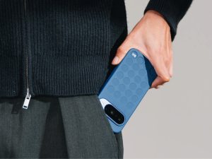 Textured phone case paired with layered everyday clothing